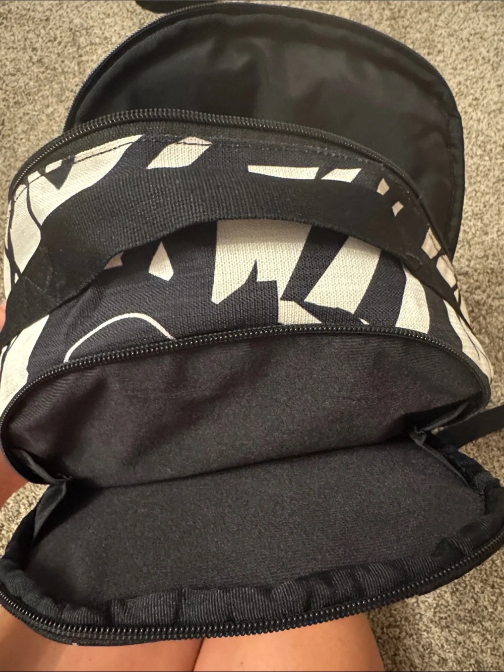 Nike Black & White Backpack with Orange Swoosh